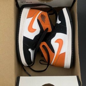 Jordan Black and Orange Sneakers